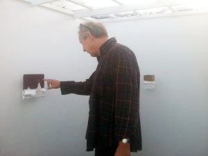 pointing visitor At Museum of Le Pense Bête III